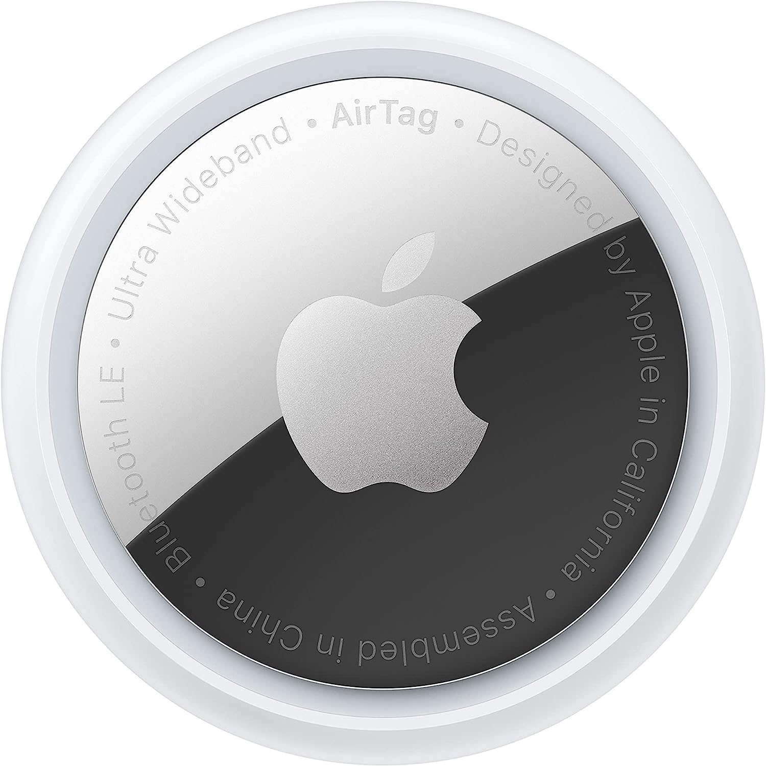 The image shows an Apple AirTag, which is a small tracking device designed by Apple to help people keep track of and locate personal items. The item is circular, with a white and silver design, featuring an Apple logo on the metallic surface. It also has text that includes 