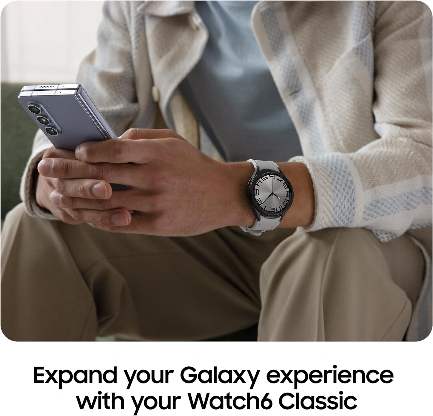 The image is of a person's wrist wearing a smartwatch, which appears to be a Samsung Galaxy Watch 6 given the context of the text. The text reads 