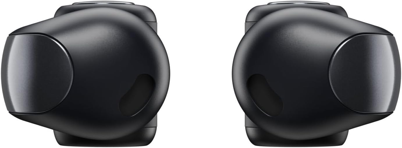 This image shows a pair of black Bose Ultra Open earbuds, specifically in-ear style. The earbuds have a distinctive design, with rounded contours and an ergonomic shape likely meant to fit securely and comfortably in the user’s ears. They have no visible wire, indicating that they are true wireless headphones designed for portability and convenience, often used with smartphones, tablets, or other Bluetooth-enabled devices for listening to music or making calls without the hassle of tangled cords.