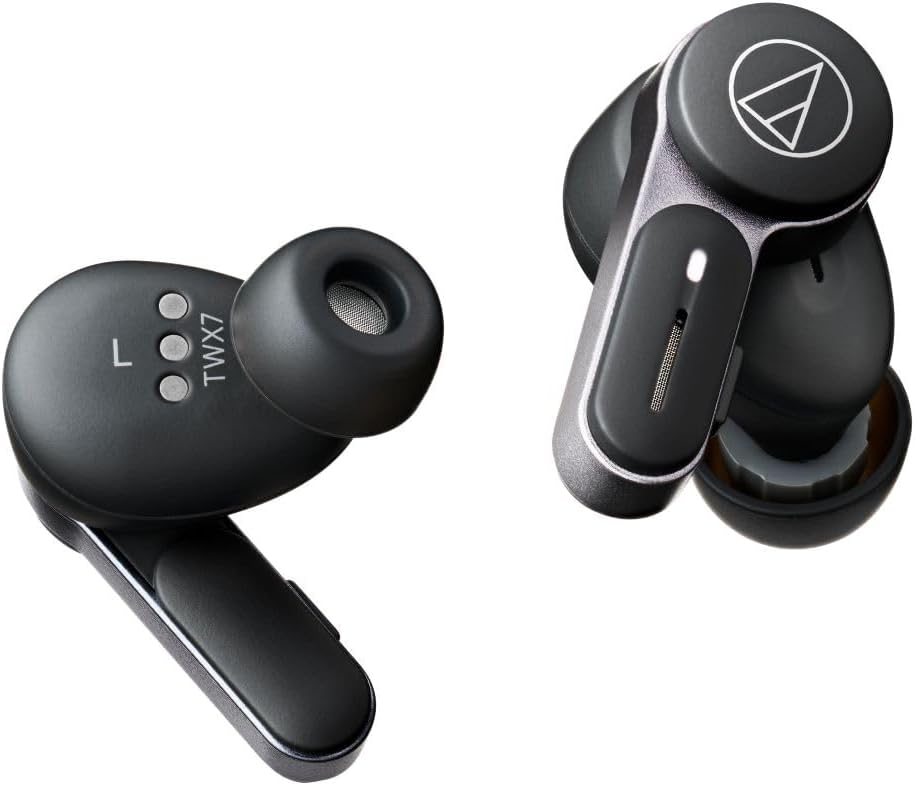 The image shows a pair of Audio-Technica ATH-TWX7 earbuds. These are modern, in-ear style earphones designed to connect to devices like smartphones, tablets, and computers via Bluetooth for audio playback without the need for cables. The earbuds have a charging contact point and generally come with a charging case (not shown in the image) that houses and charges them when not in use.